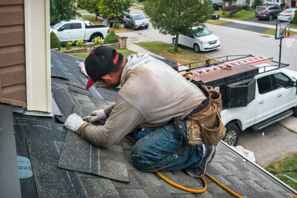 Professional Gutter Repair And Installation technician working in Wind Gap, PA